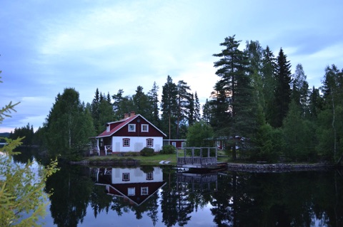 Red and white house by a lake, Sweden