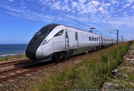 Train travelling along a coastline